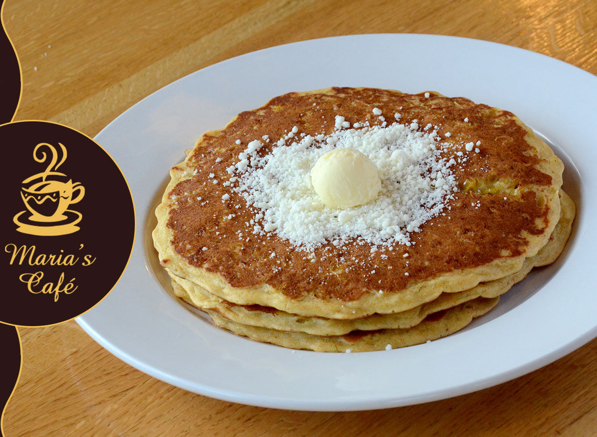 stack of pancakes topped with butter