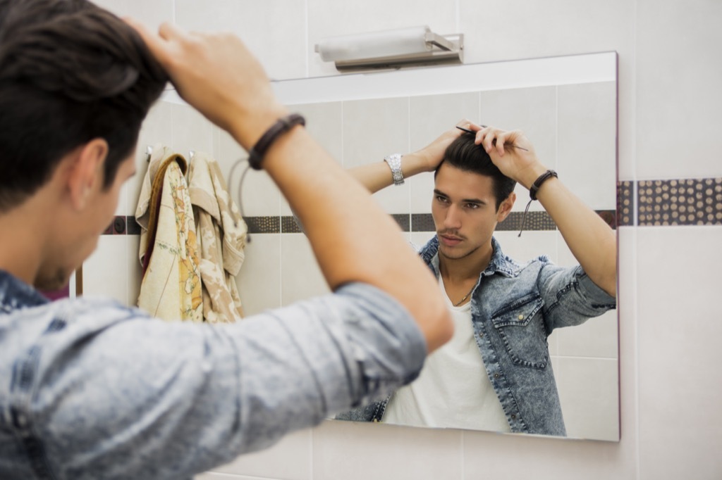 man combing hair