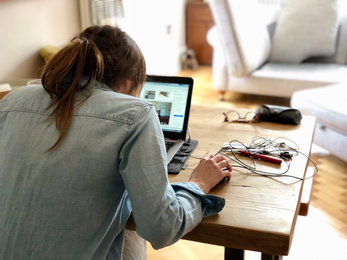 Woman with bad posture working