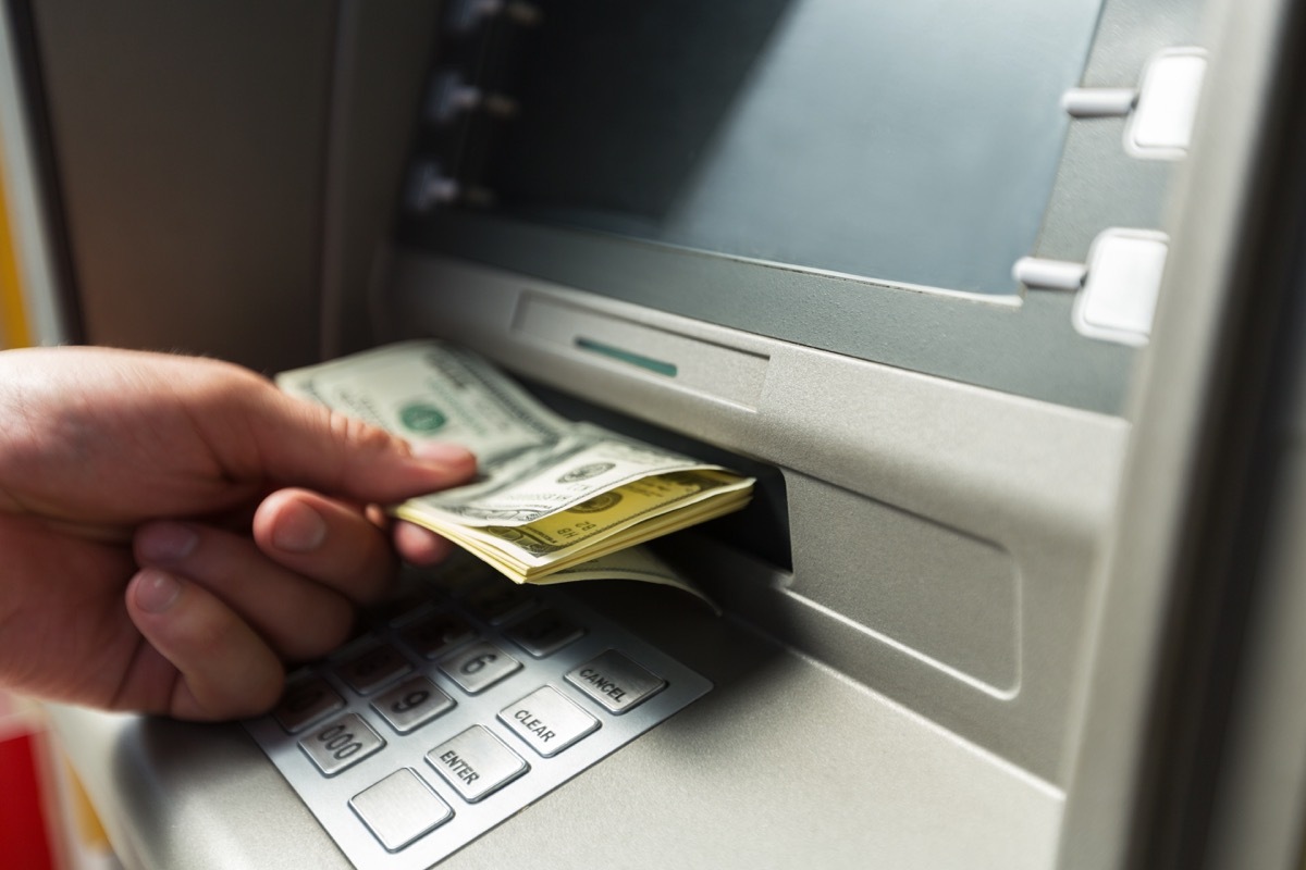 Person using bank atm