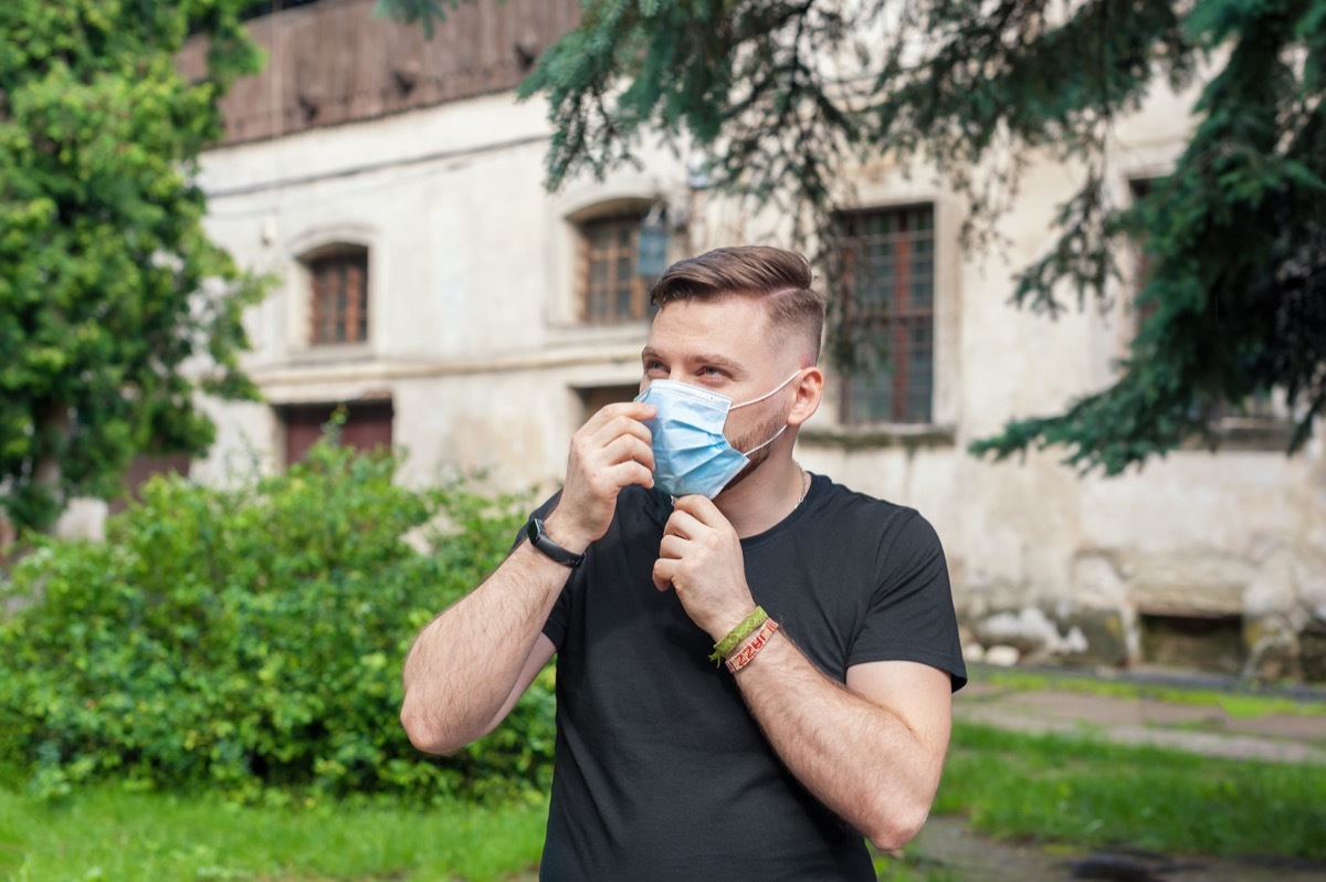 Man wearing a mask outside during COVID pandemic