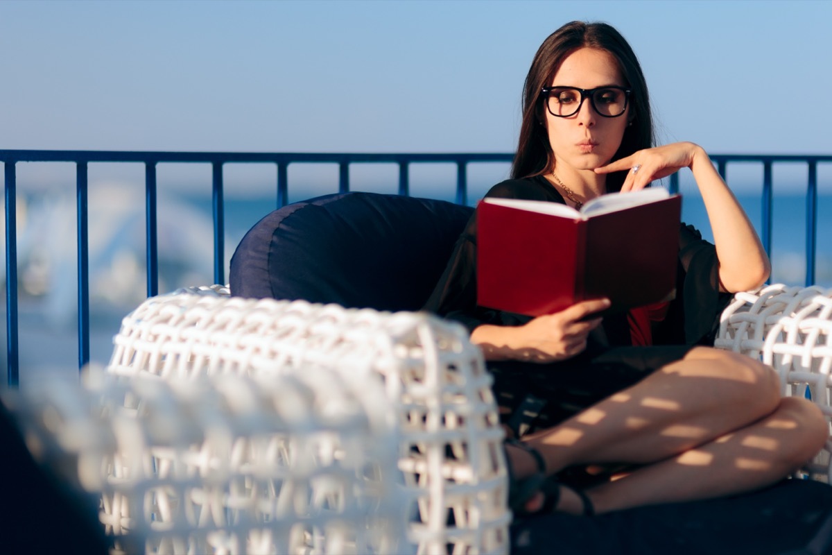 Woman Intensely Reading Outside