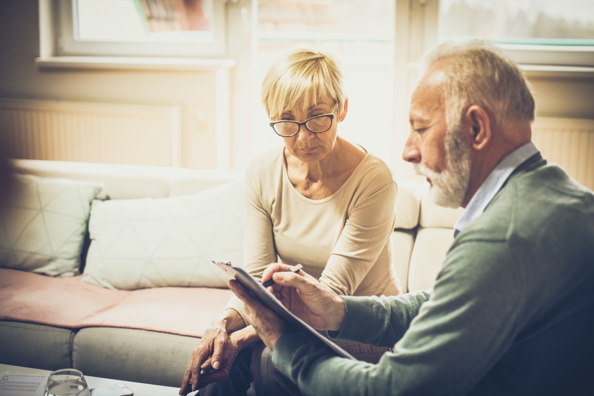 older couple talking over and compromising with each other