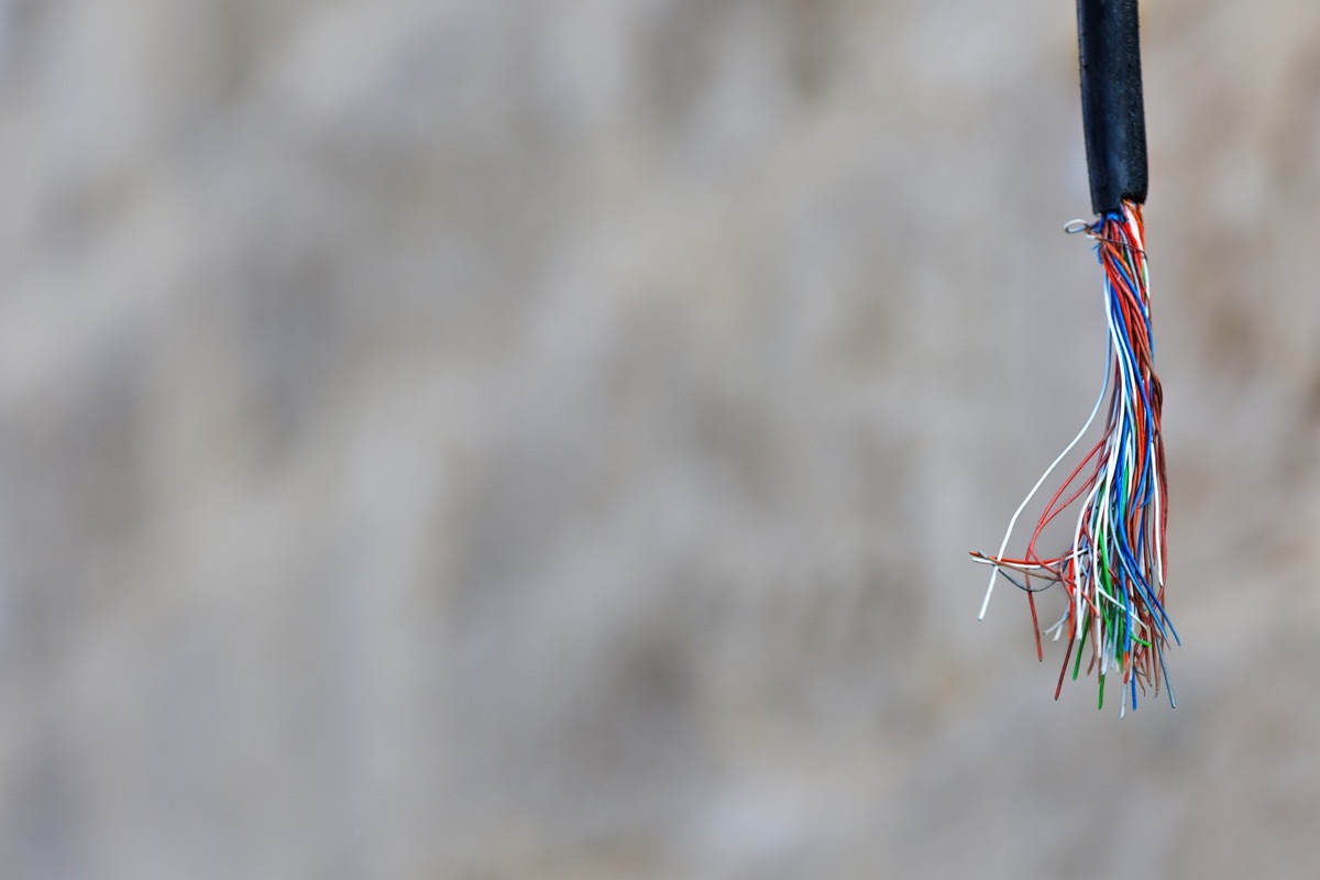 Hanging down cut multi colored communication cable