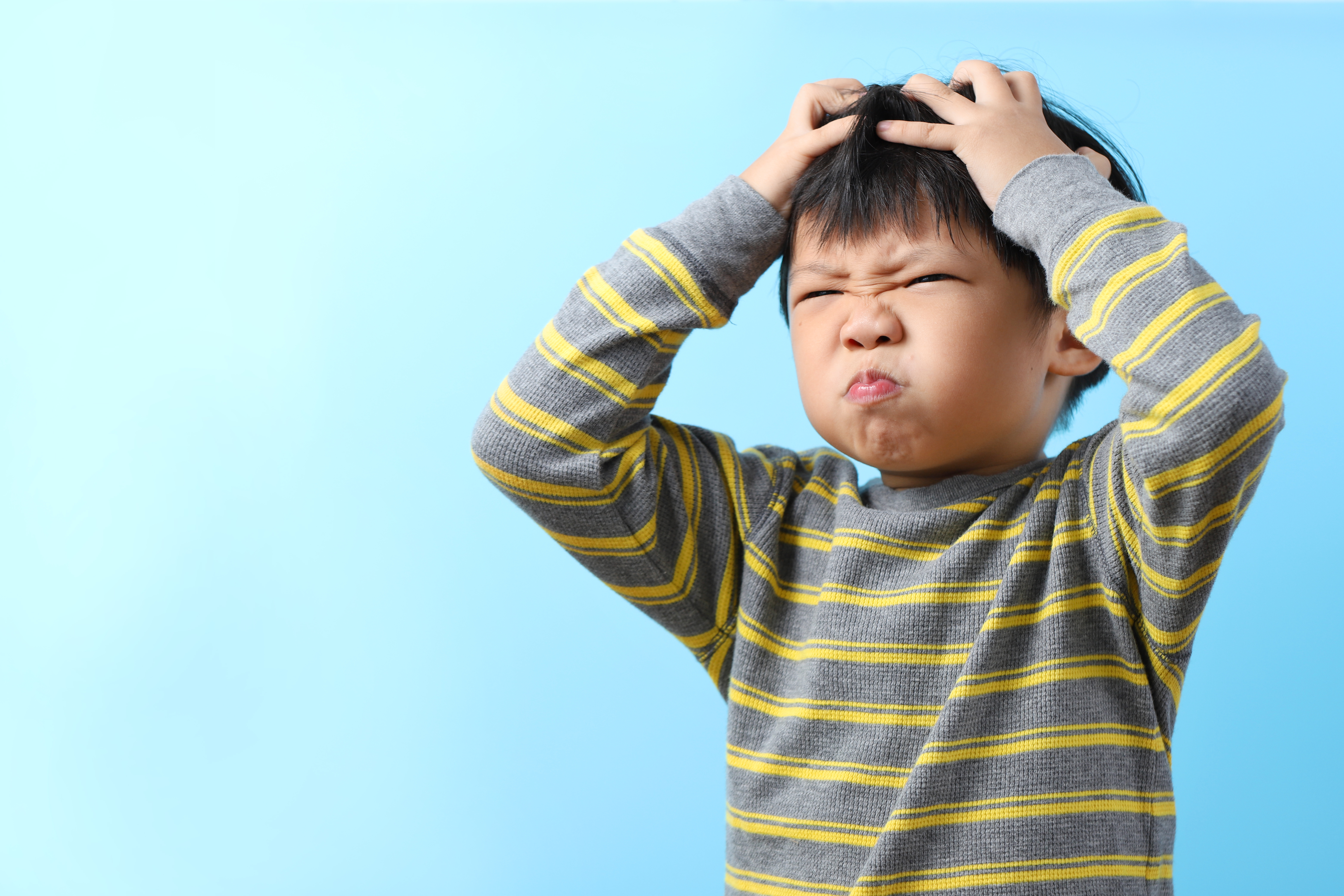 little boy frustrated over trick questions