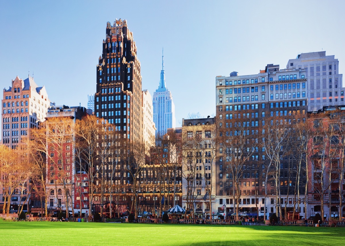 Green Lawn and Skyscrapers in Bryant Park in Midtown Manhattan, New York of USA.