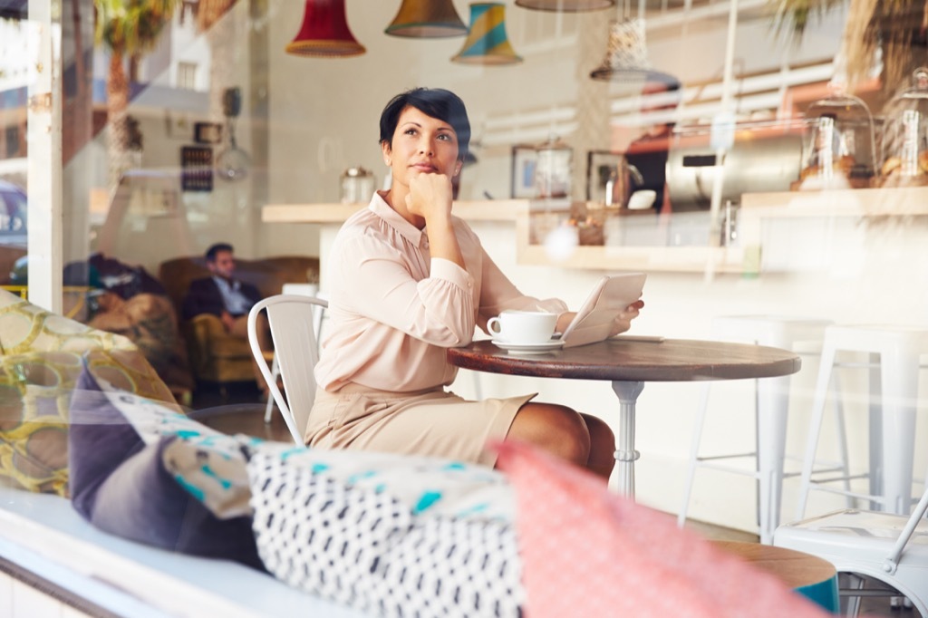 Woman Thinking at a Cafe {Conquer Negative Thinking}