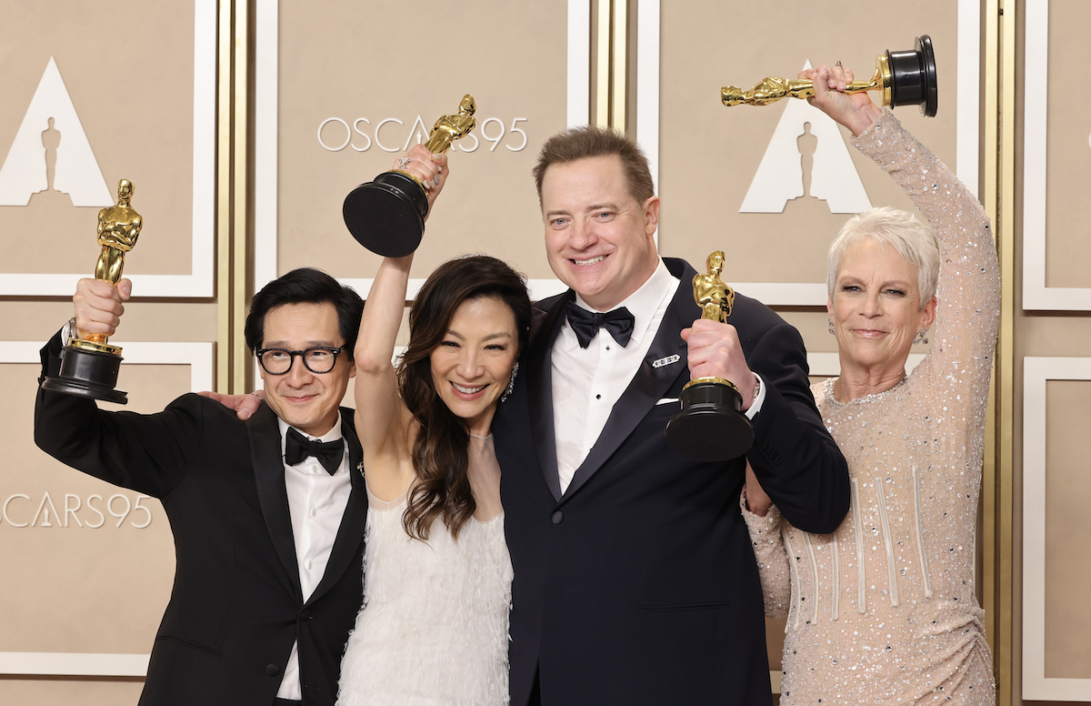 Ke Huy Quan, Michelle Yeoh, Brendan Fraser, and Jamie Lee Curtis with their Oscars