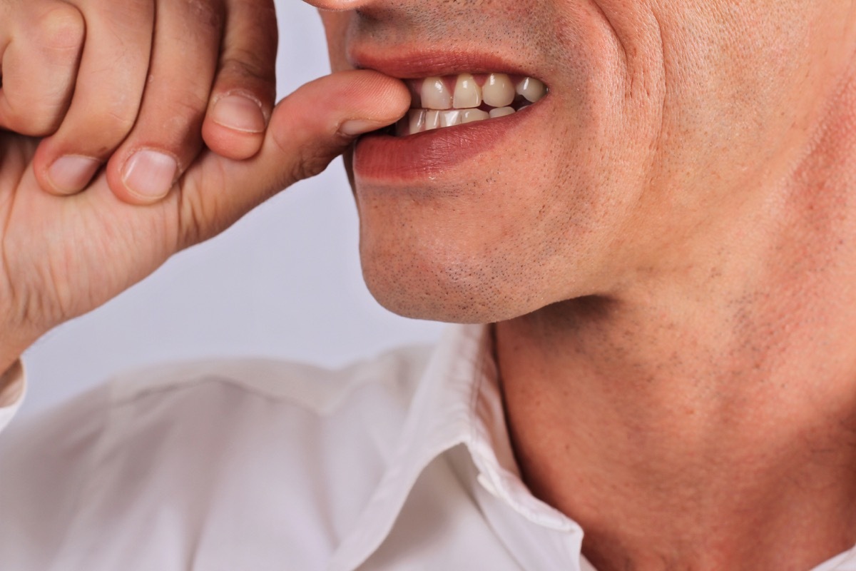 Nervous Man Biting His Nails Childhood Habits that Affect Health