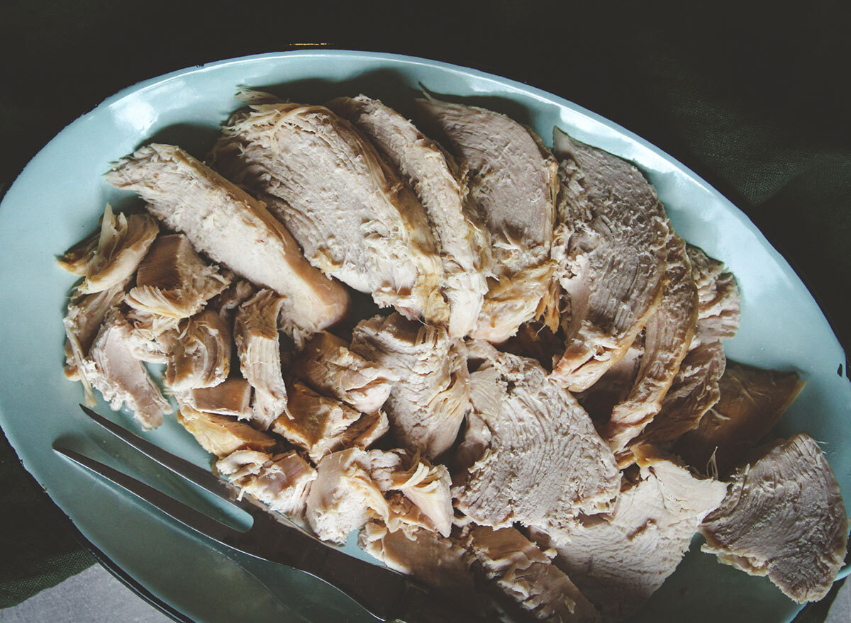 slices of cooked turkey breast on serving platter