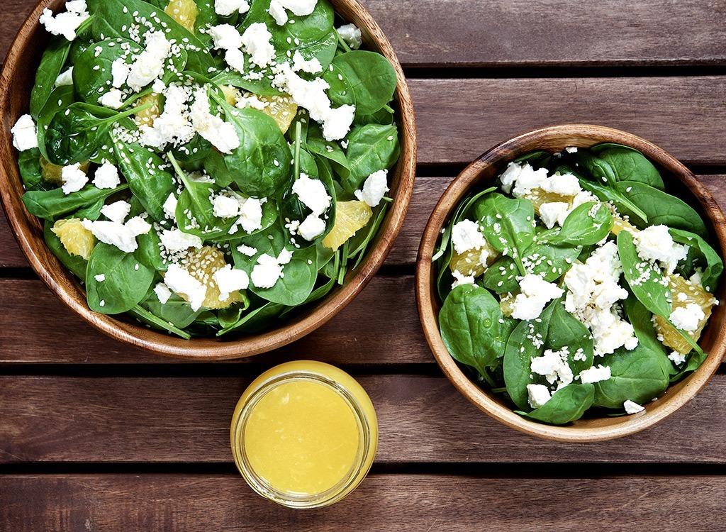 spinach in wood bowls 