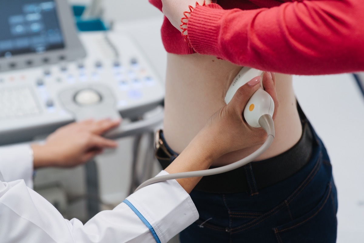 Doctor giving kidney ultrasound