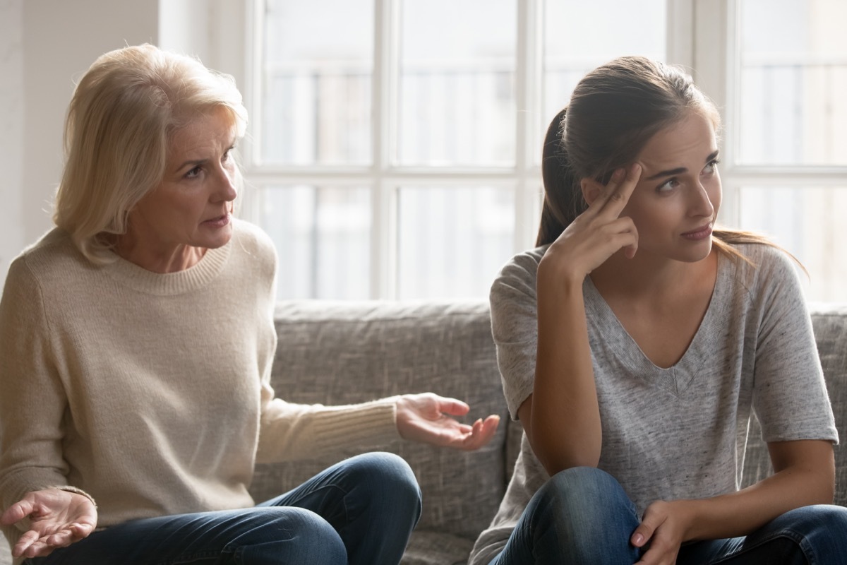 Older woman frustrated during conversation with younger woman