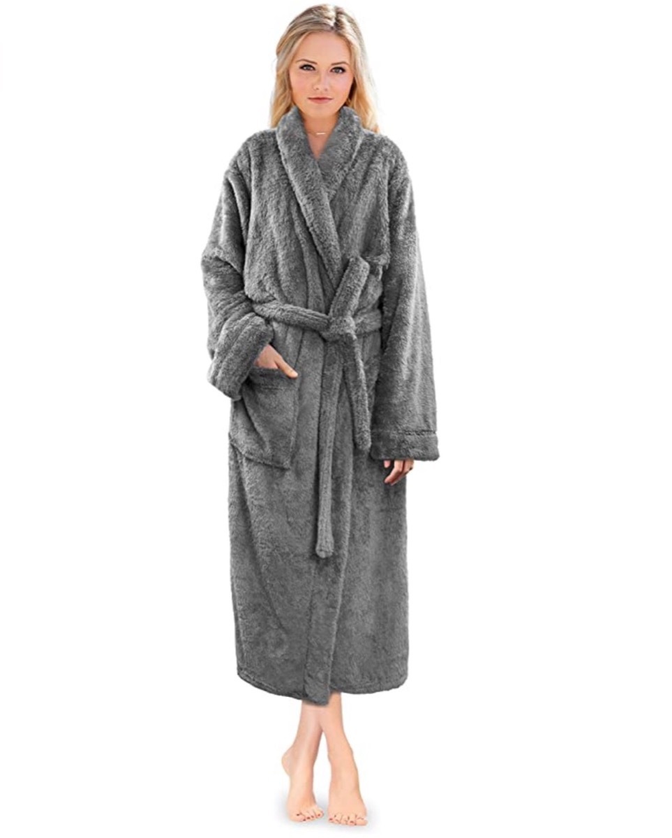 young blonde woman in gray fluffy robe