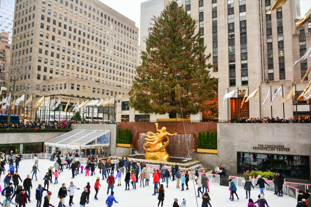 people ice skating in rockefeller center new york