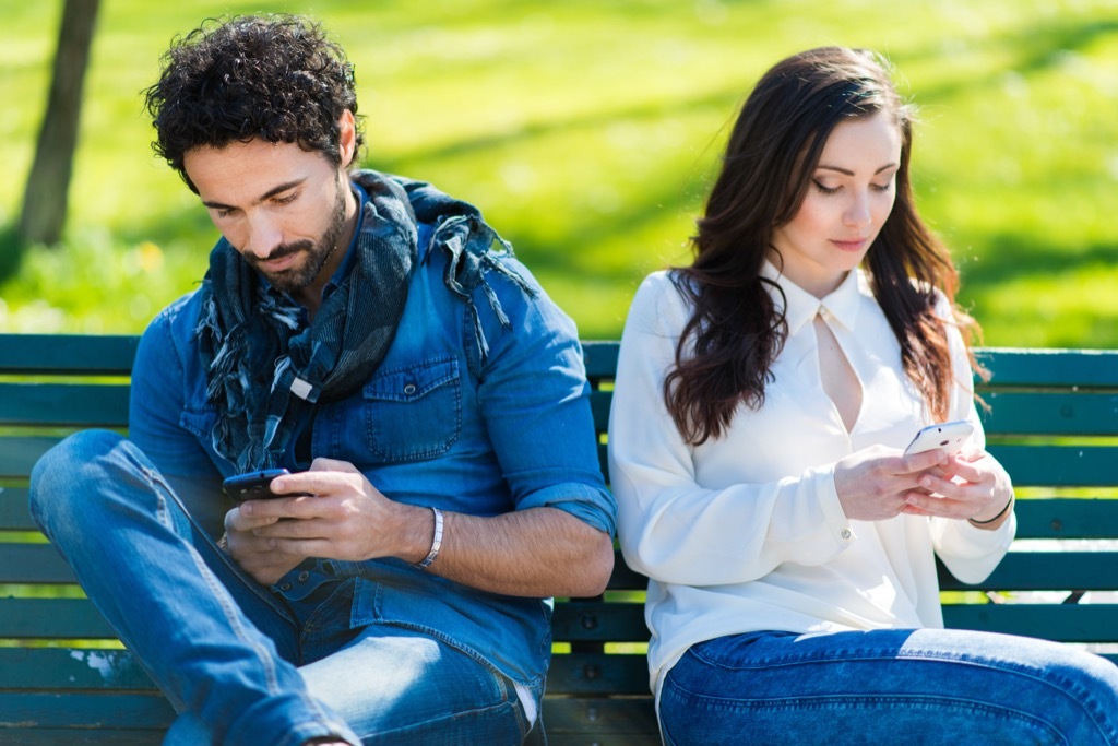 Couple on Phones Charming