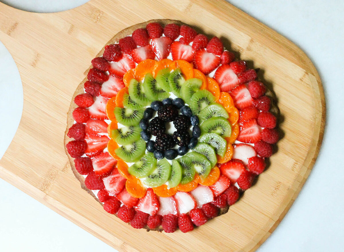 Whole fruit pizza ready to slice up for dessert