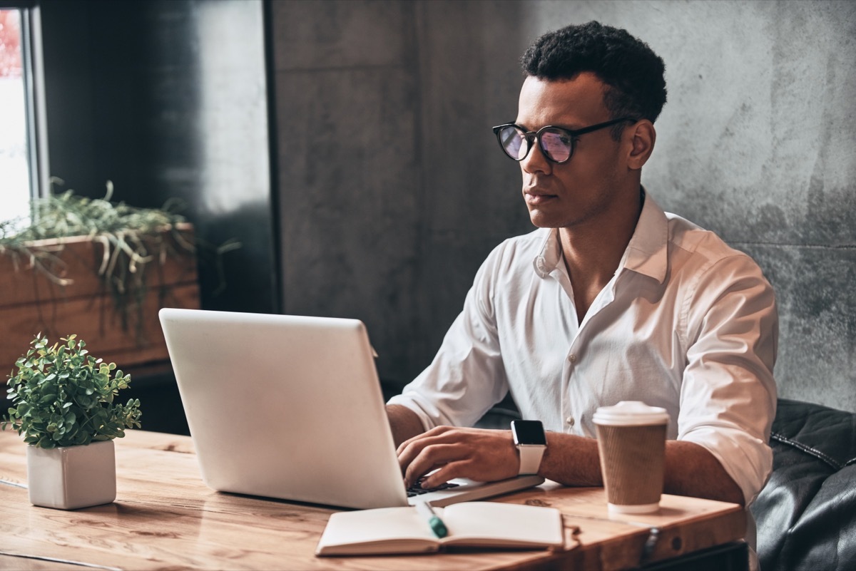 Young Black Man Working