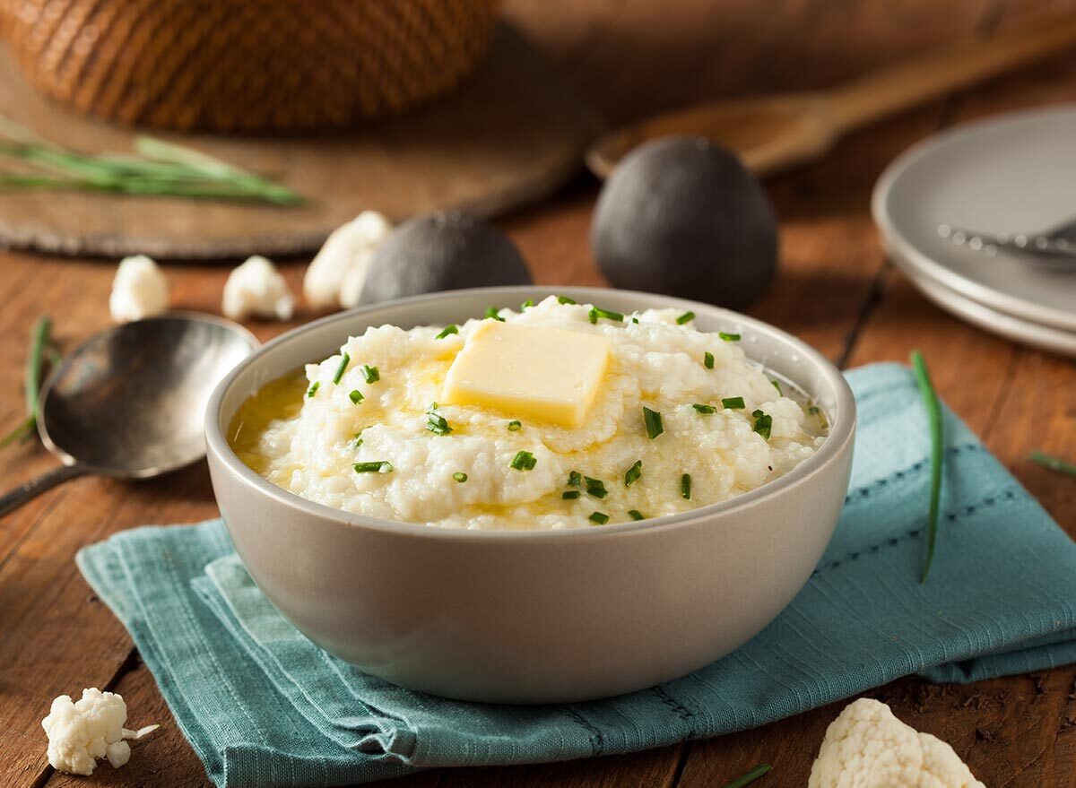 Homemade organic mashed cauliflower with butter and chives