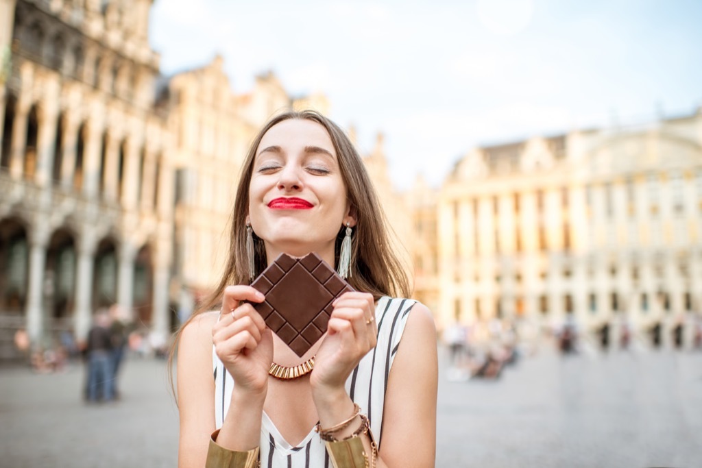 woman eating dark chocolate