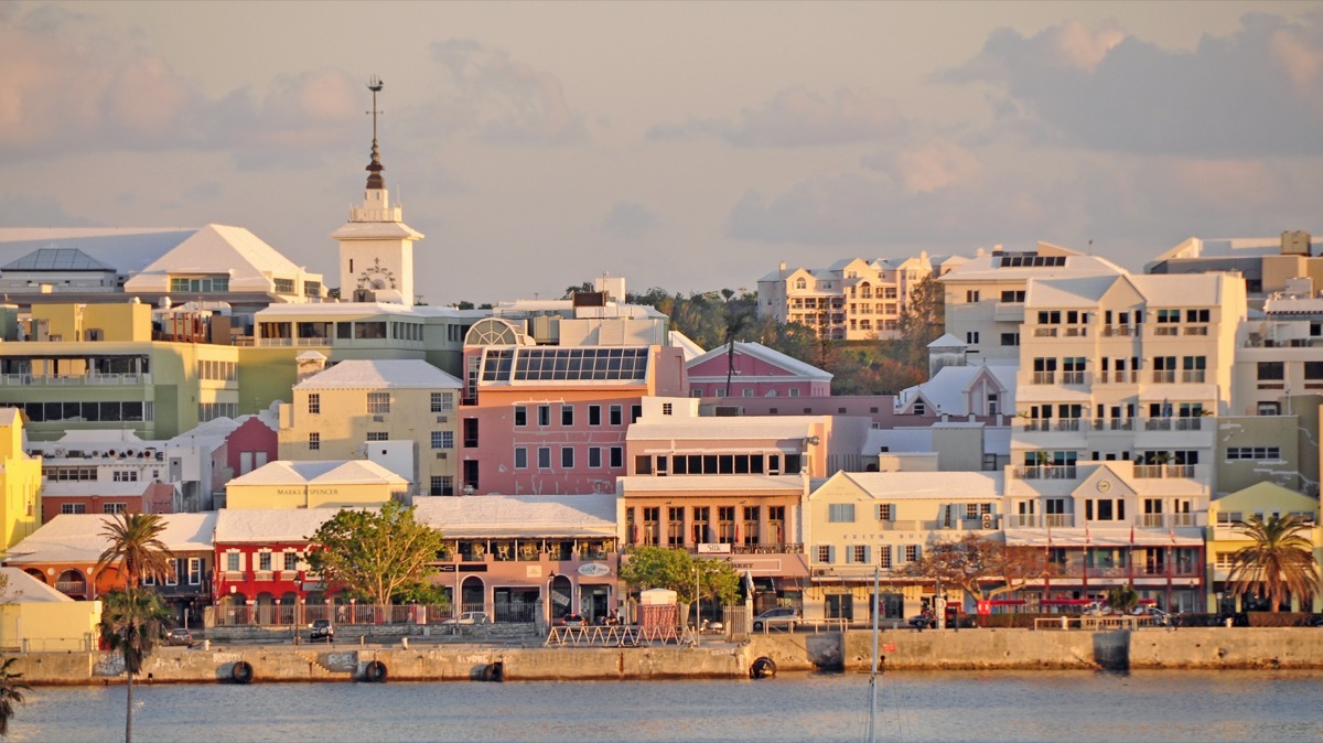 from the bay, a view of the capital city, Hamilton, Bermuda at sunset.