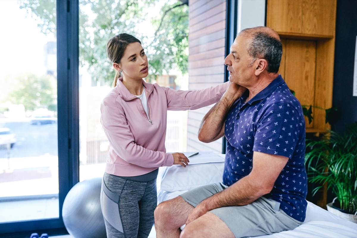 Shot of a senior man visiting a physiotherapist for a consultation