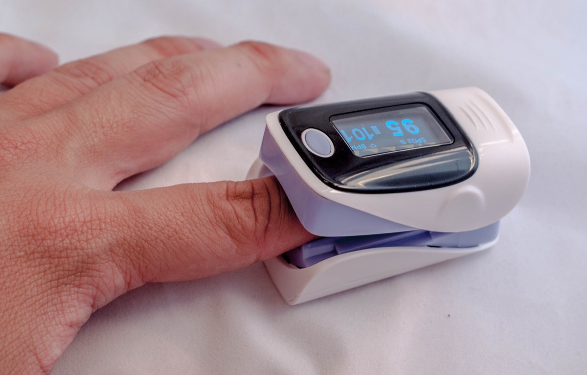 Finger inside blood oxygen monitor