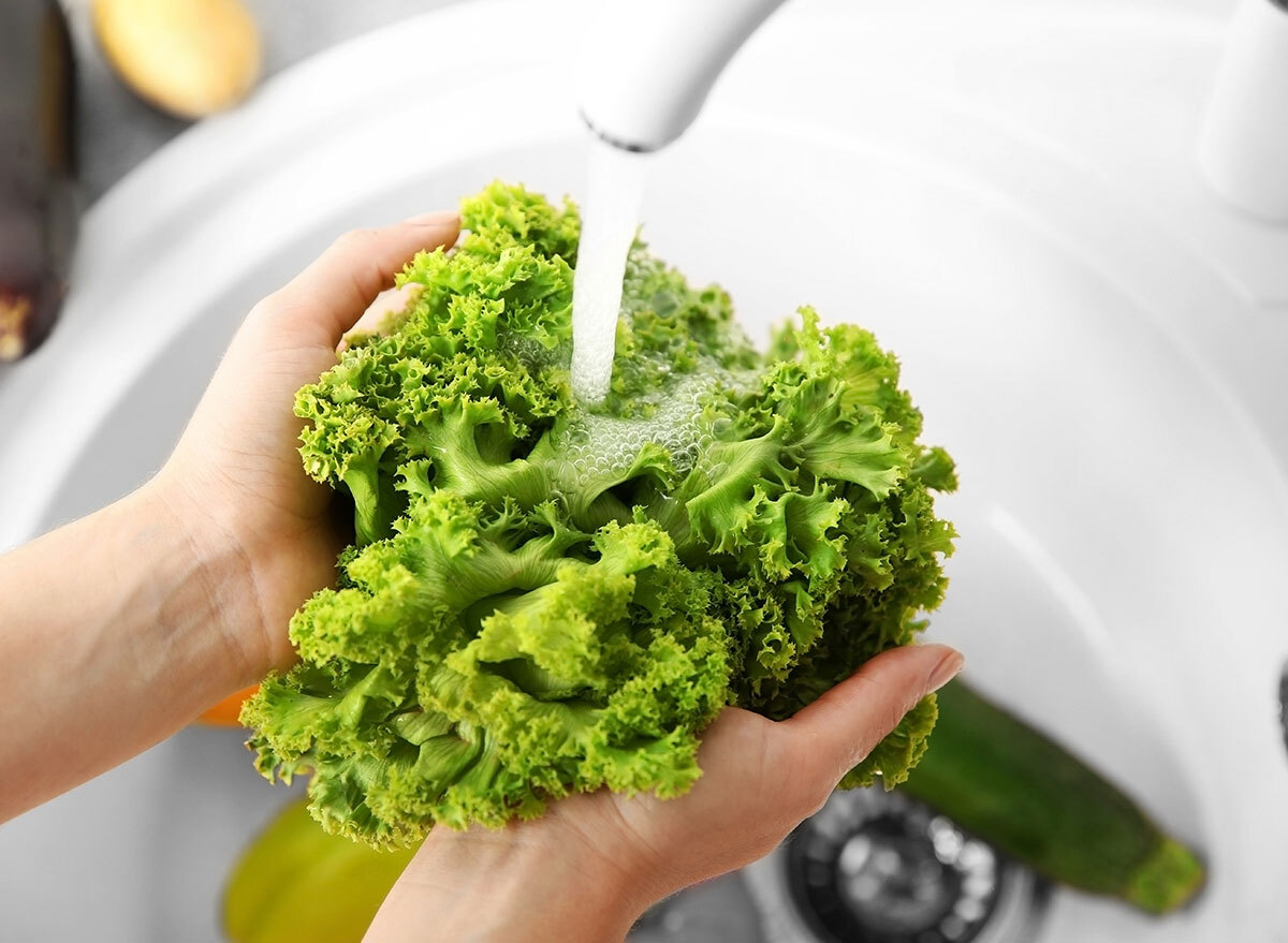 Women washing lettuce