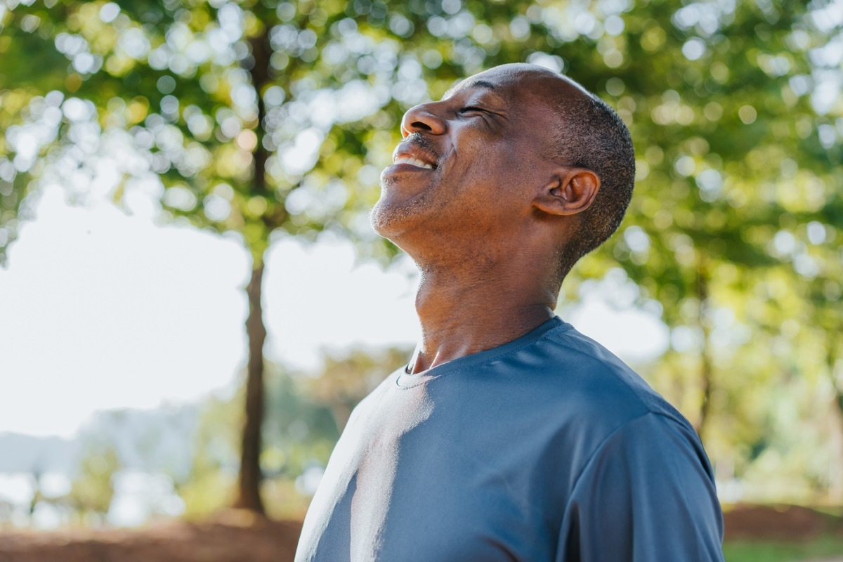 Portrait of a mature man breathing fresh air