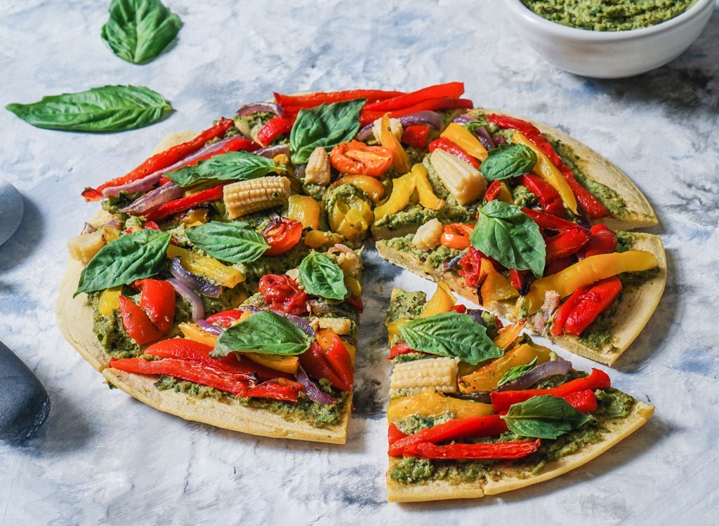 chickpea pizza with vegetables on it