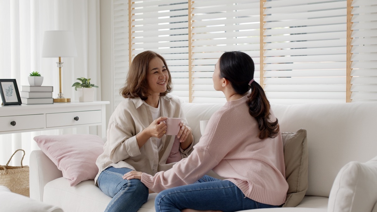 mother and daughter having conversation