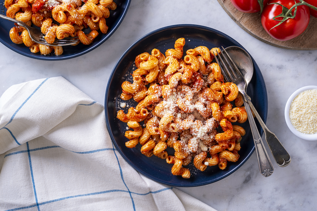 Delicious cavatappi pasta with tomato sauce and parmesan cheese.