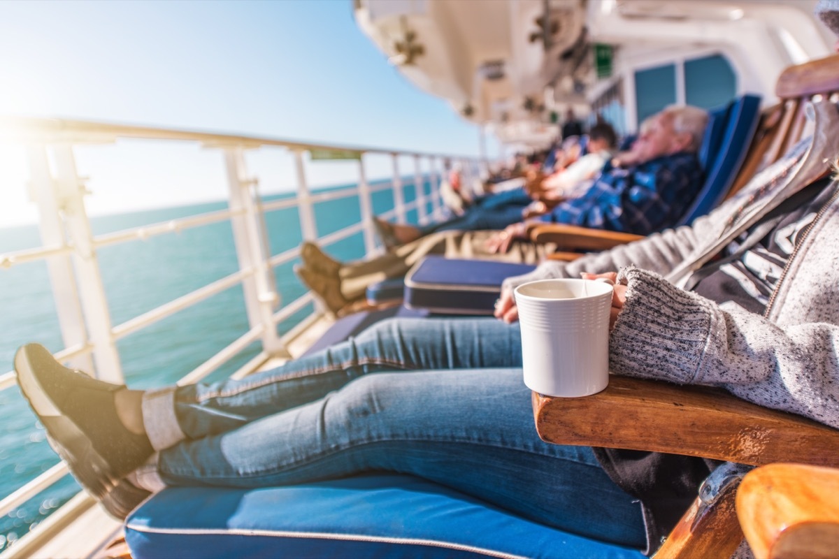 Deckchairs Cruise Ship Relax. Cruise Guest Relaxing in the Sun. Commercial Maritime Theme.