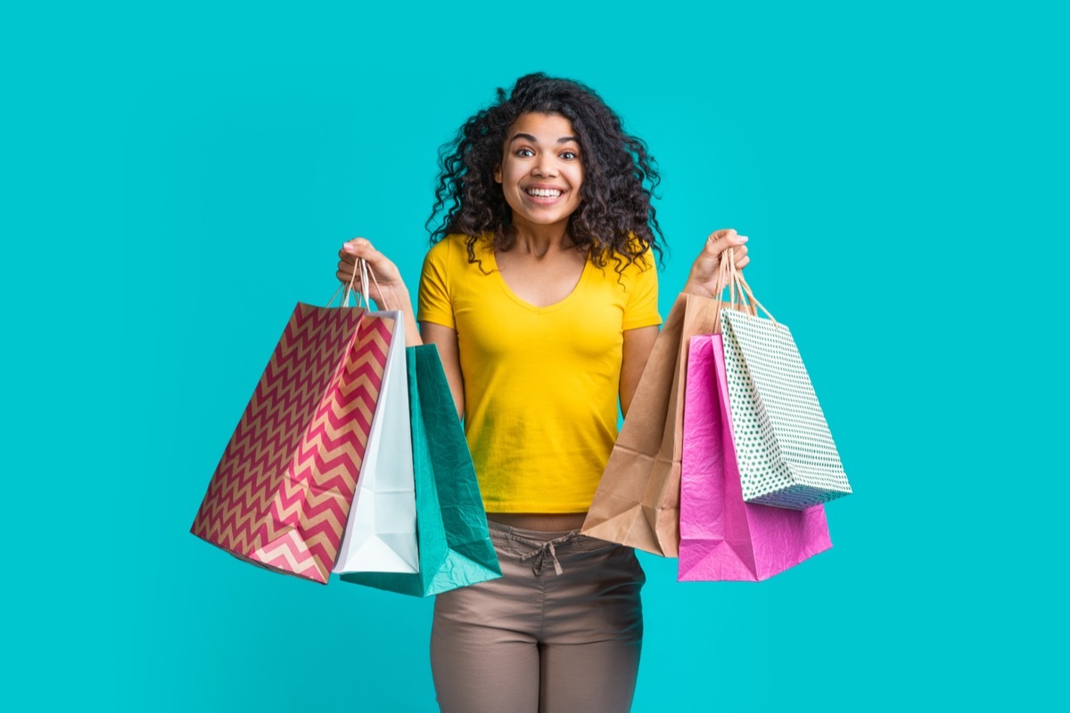 woman holding shopping bags