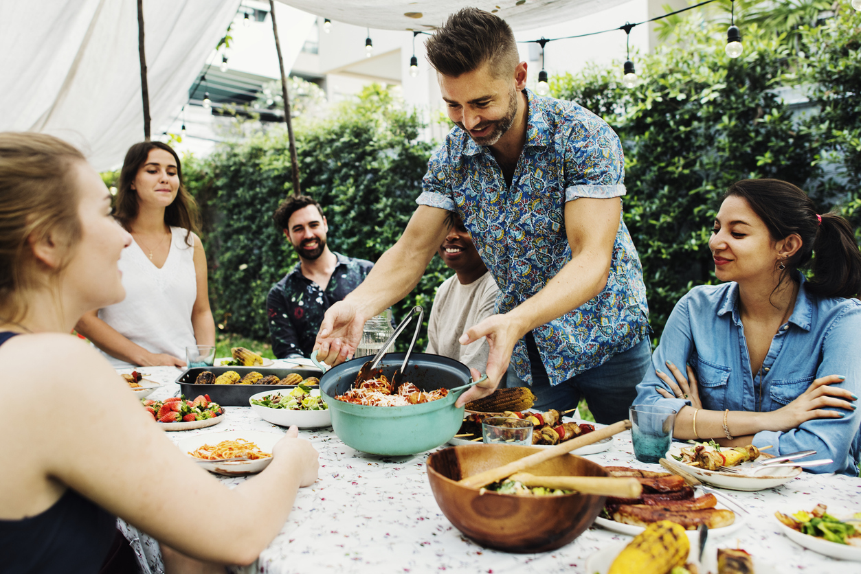 Group of diverse friends enjoying summer party together