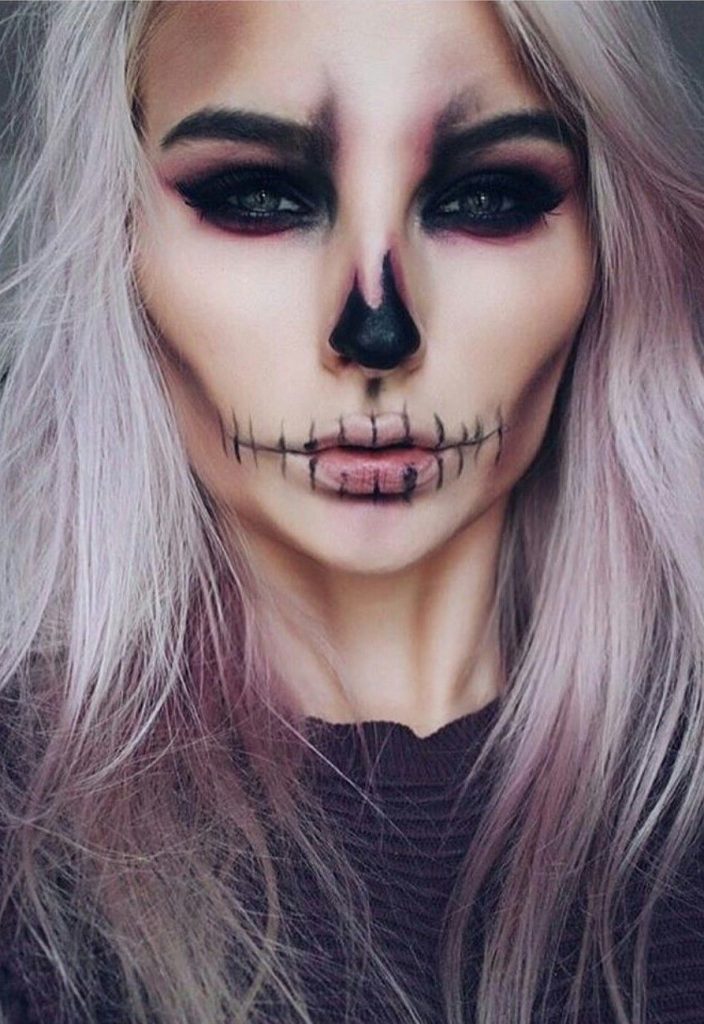 Skull  face #2  |  11 Creepy and Cool Halloween Makeup Ideas to Try This Year |  HerBeauty