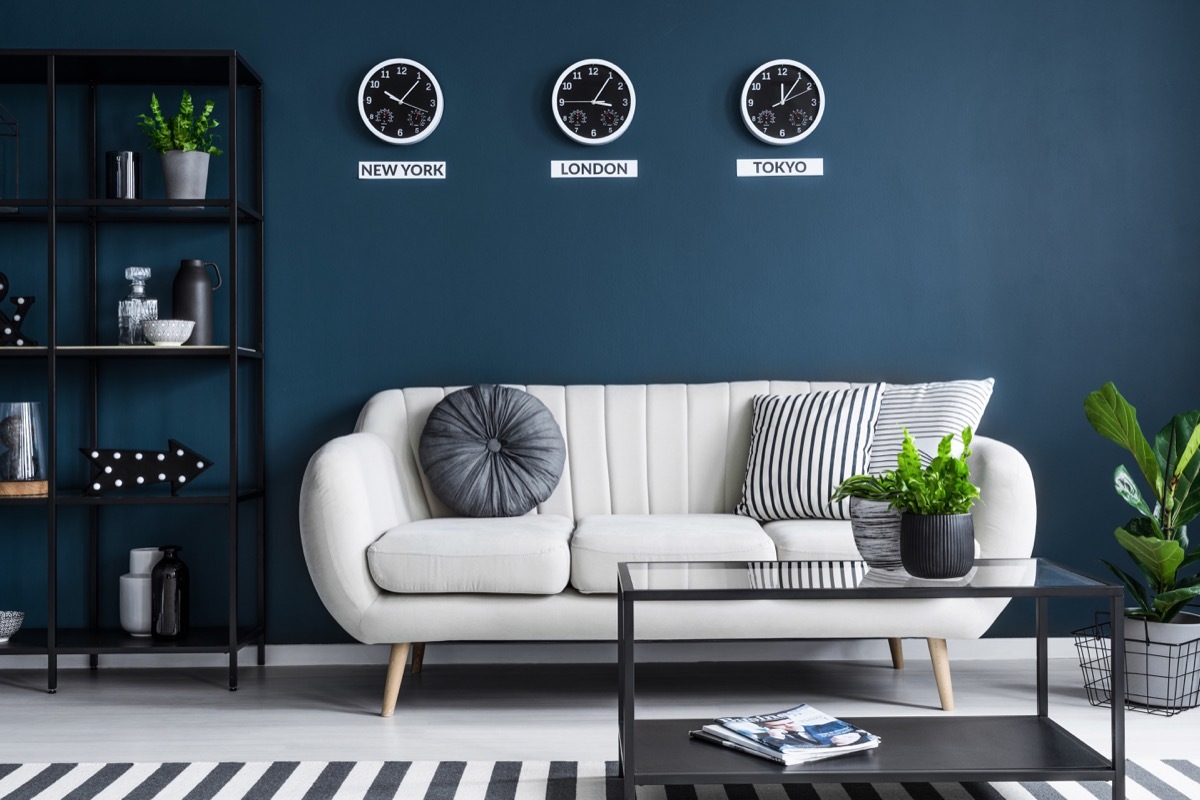 room with dark navy walls colors that make small rooms feel bigger