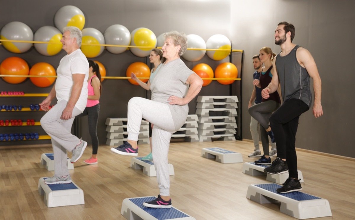 People taking a step workout class