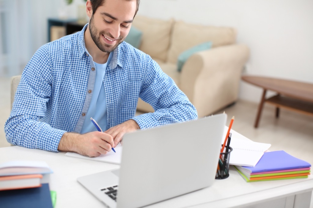 College Student Studying at Home 25 Years