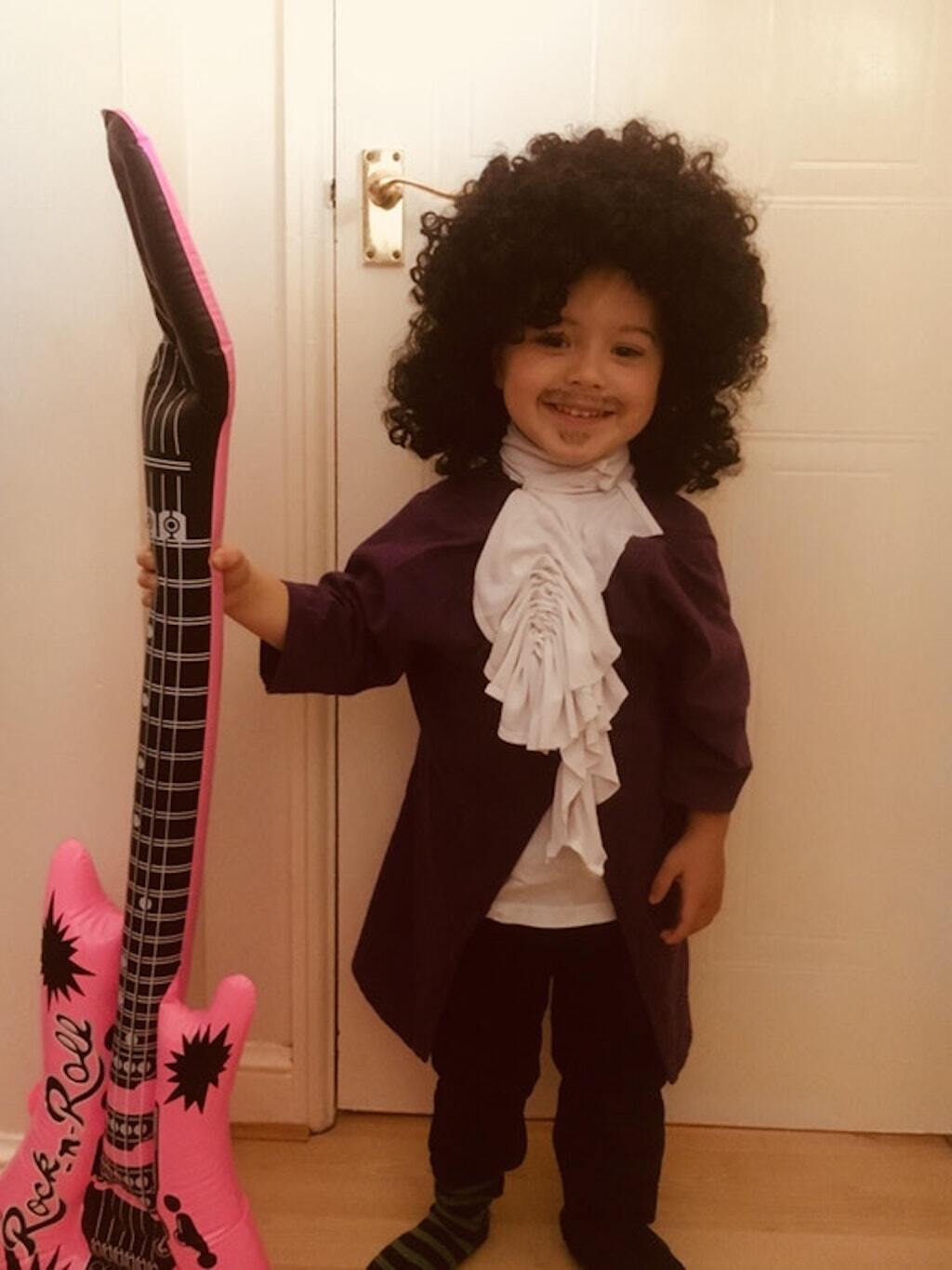 child dresses up as Prince for royal wedding. 