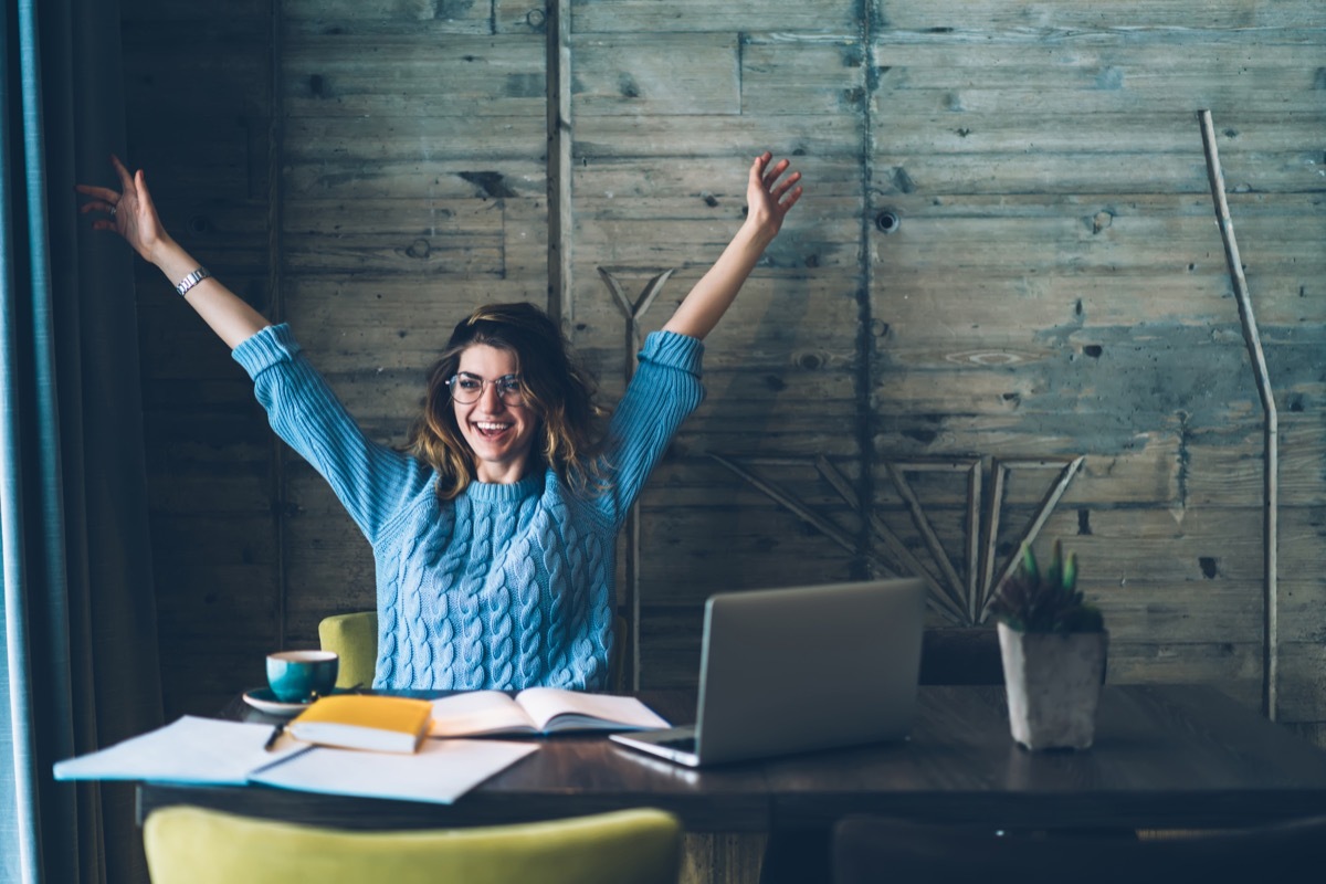 Woman Cheering After Completing Tasks