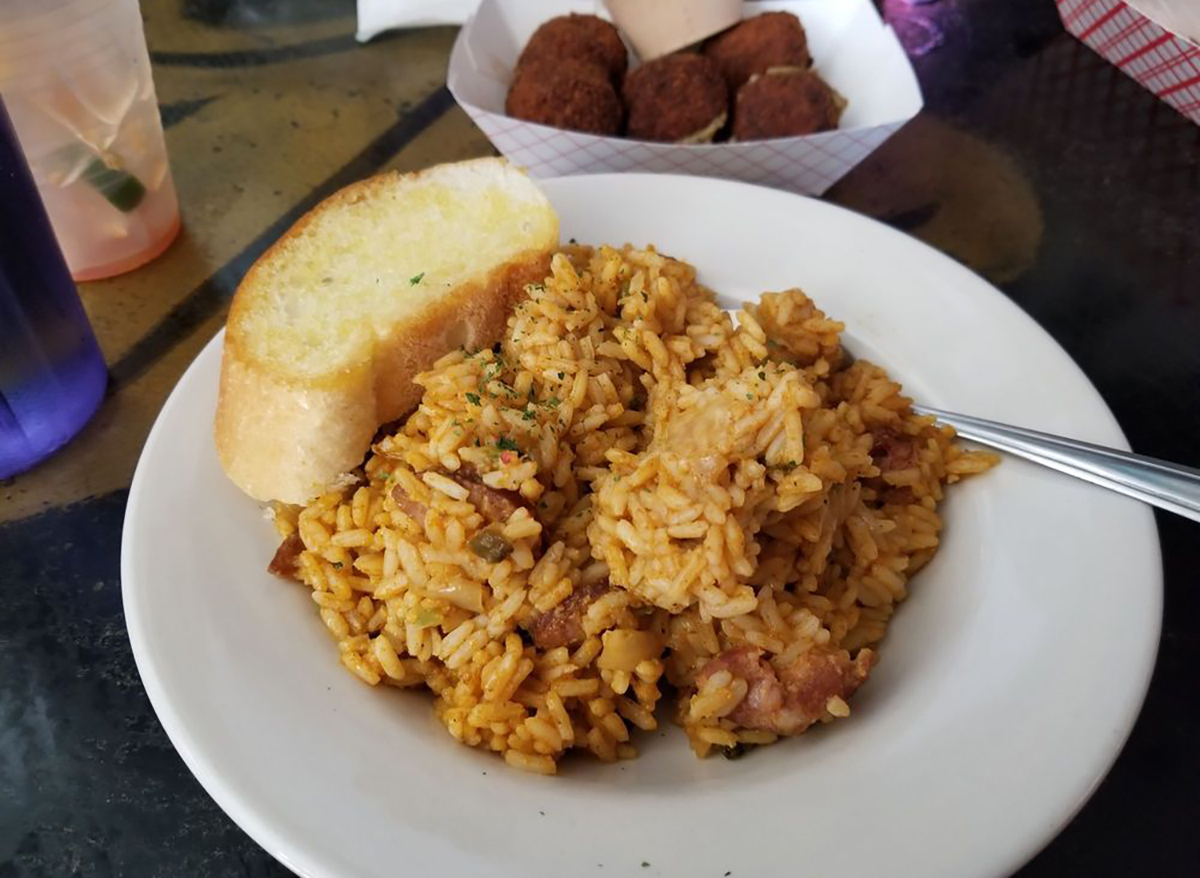 plate of jambalaya with garlic toast