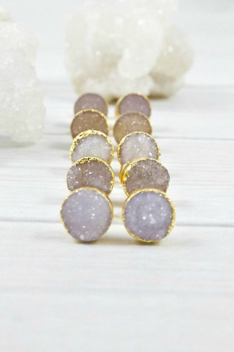 five pairs of pink raw stone earrings