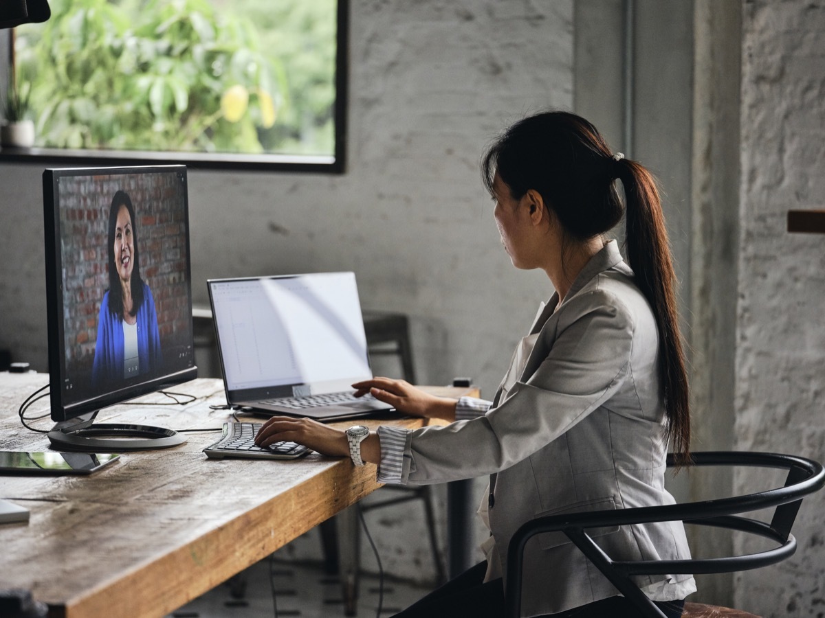 A small group of professionals at work within a co-working space