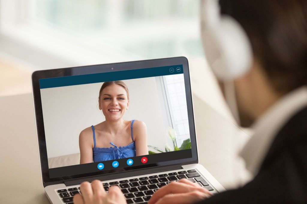 man and woman using skype