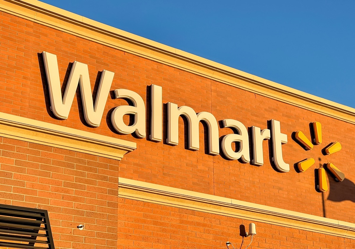 a walmart sign on a store exterior.