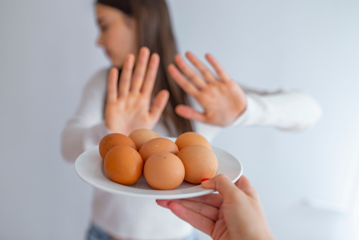 Woman refusing to eat eggs