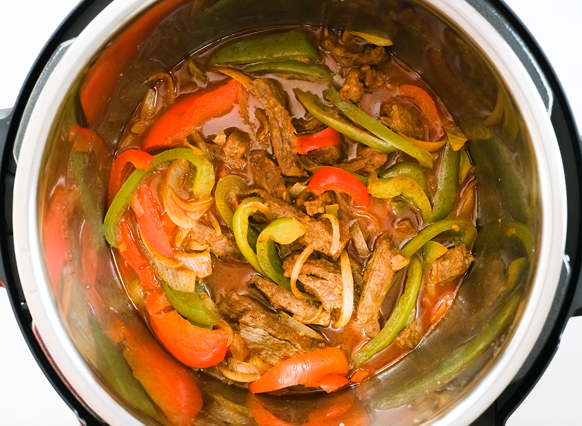 cooked steak fajitas inside an Instant Pot