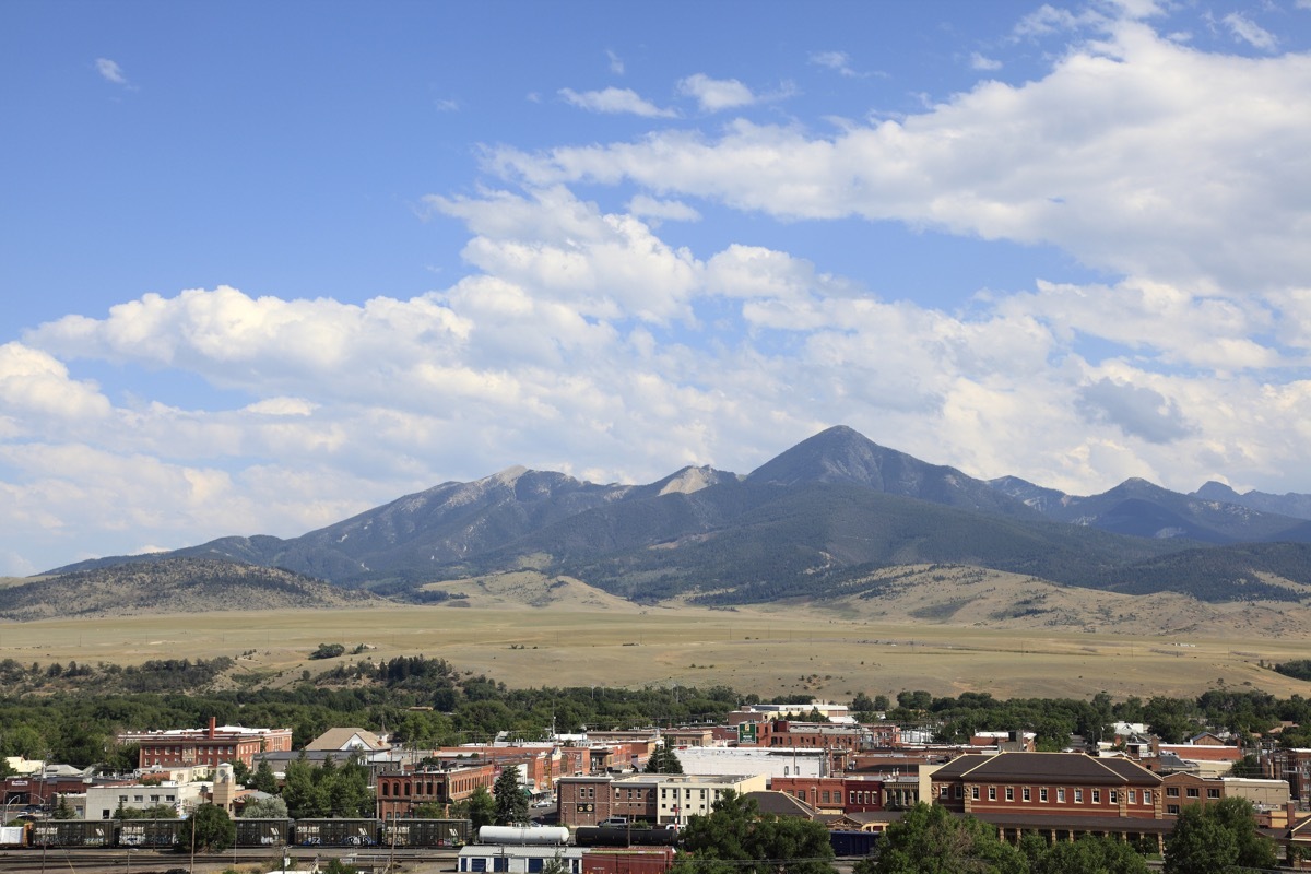 Located on the Yellowstone River and nestled beneath three Mountain Ranges . It is the primary gateway community for entering Yellowstone National Park's North entrance. Named in 1882. (Located on the Yellowstone River and nestled beneath three Mou