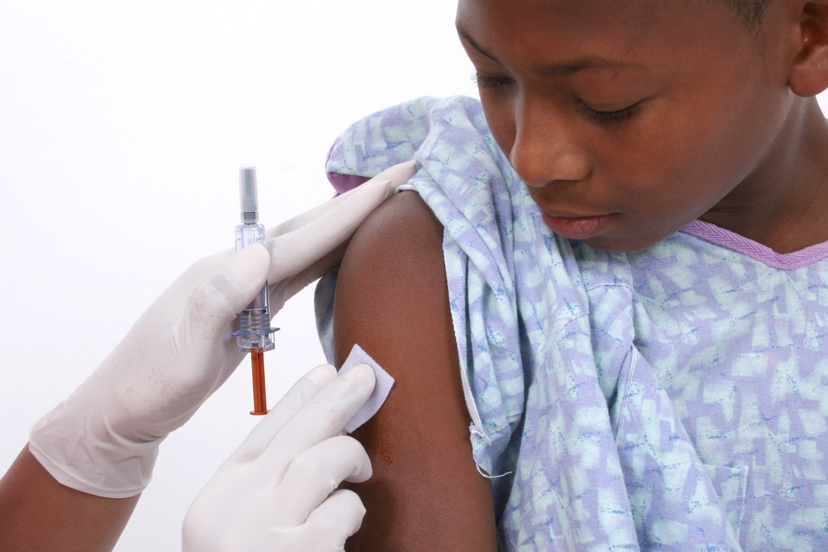 Boy getting vaccinated